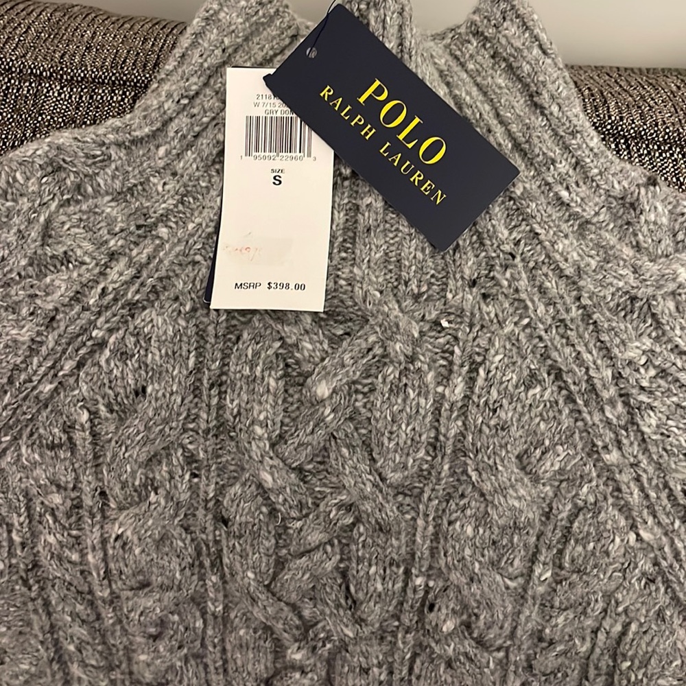 Polo sweater in grey and white and black tweed sweater with mock turtle neck .